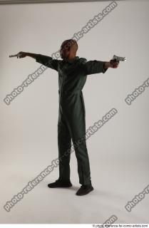 ERIC PILOT STANDING POSE WITH GUNS